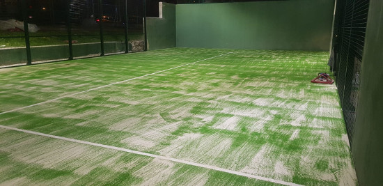 Padel court with green floor